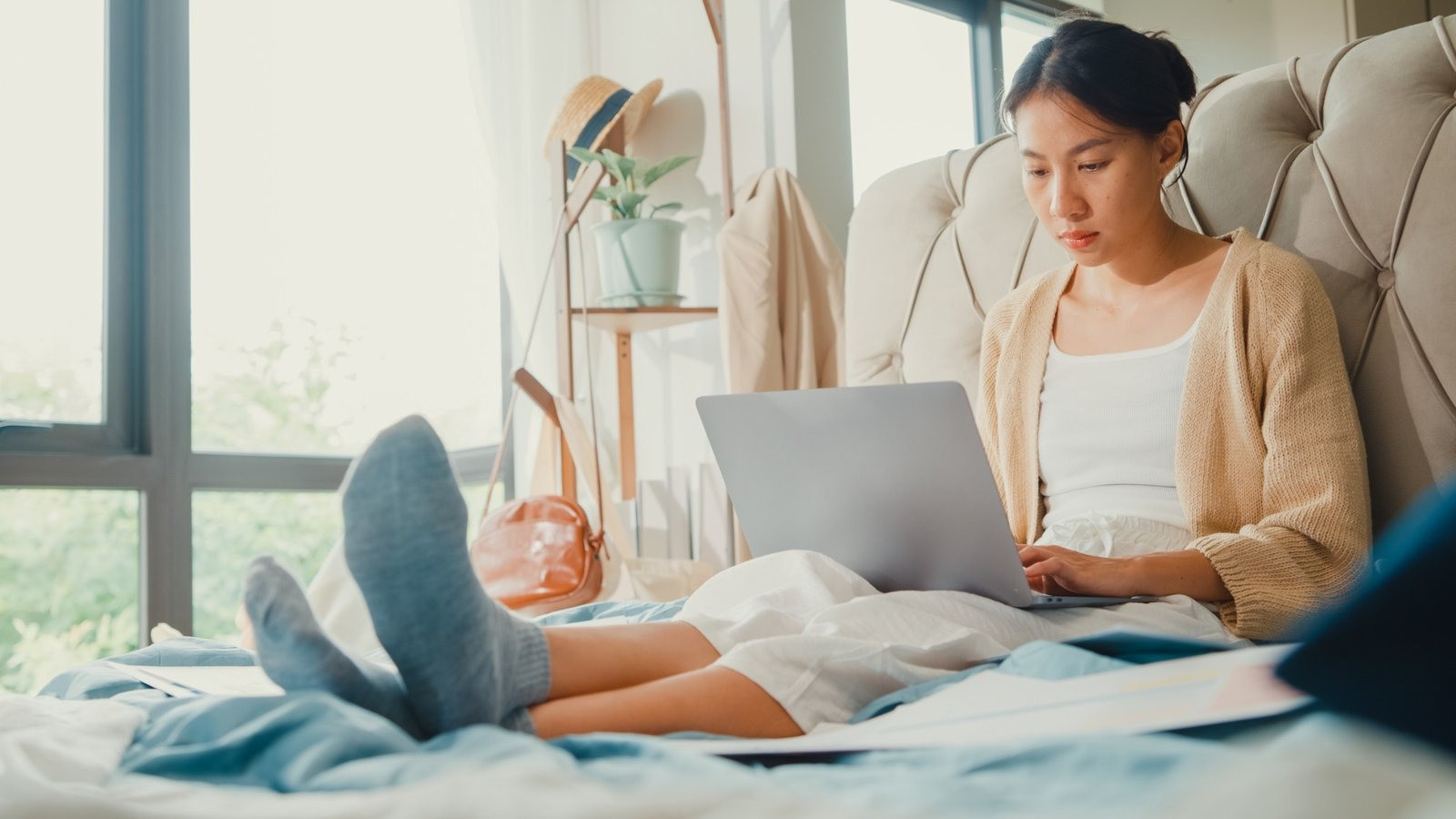 Woman using a laptop at home during an EMDR session