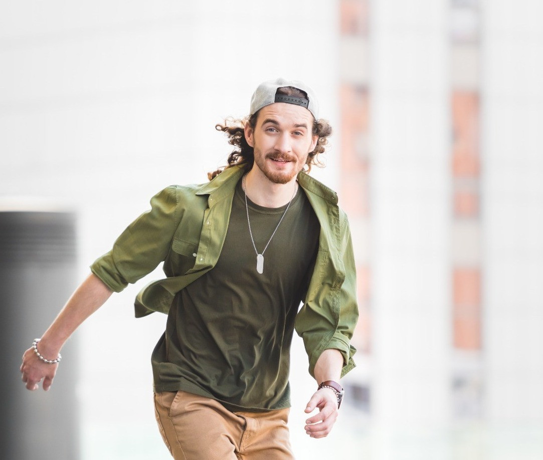 Man riding a skateboard outdoors