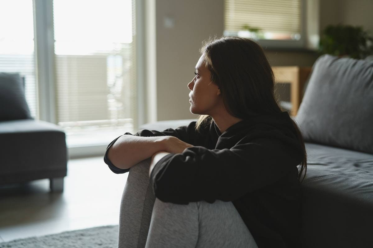 Woman reflecting on what to focus on during an EMDR session