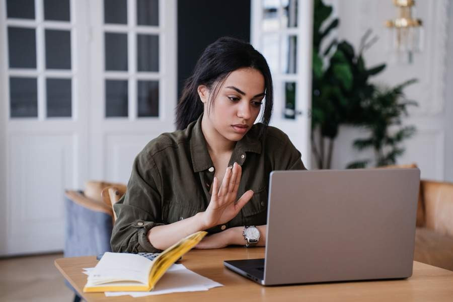 Woman taking a pause during a self-guided EMDR session