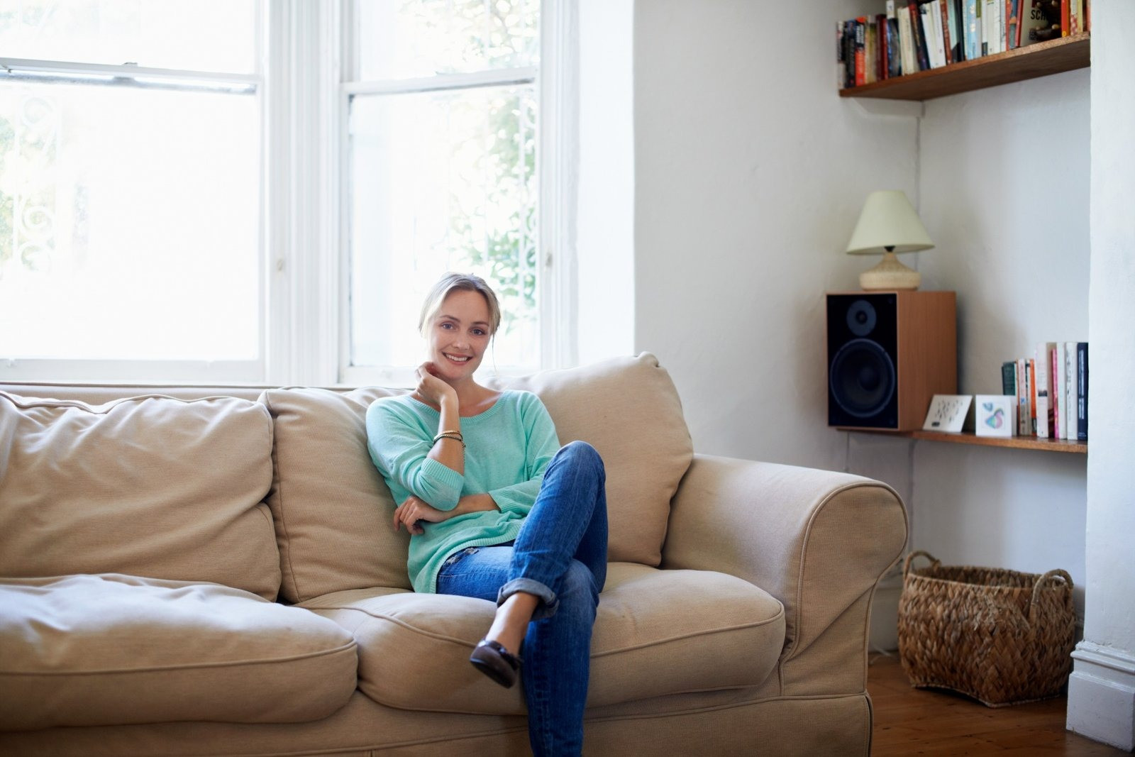 Woman sitting at home preparing to focus during an EMDR session